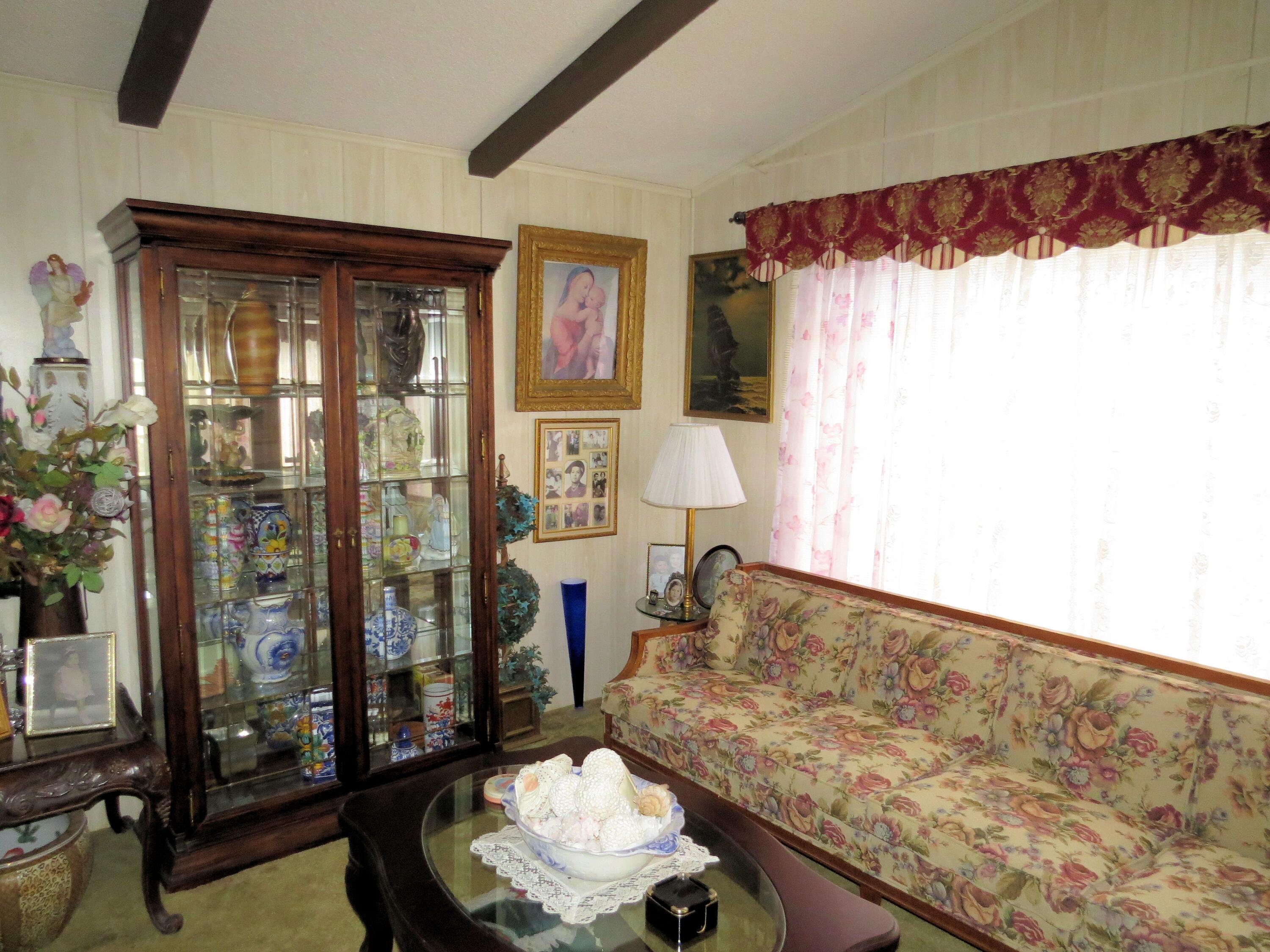 34980 Serenade Thousand Palms, CA 92276 - Photo 8 of 37 a living room with furniture