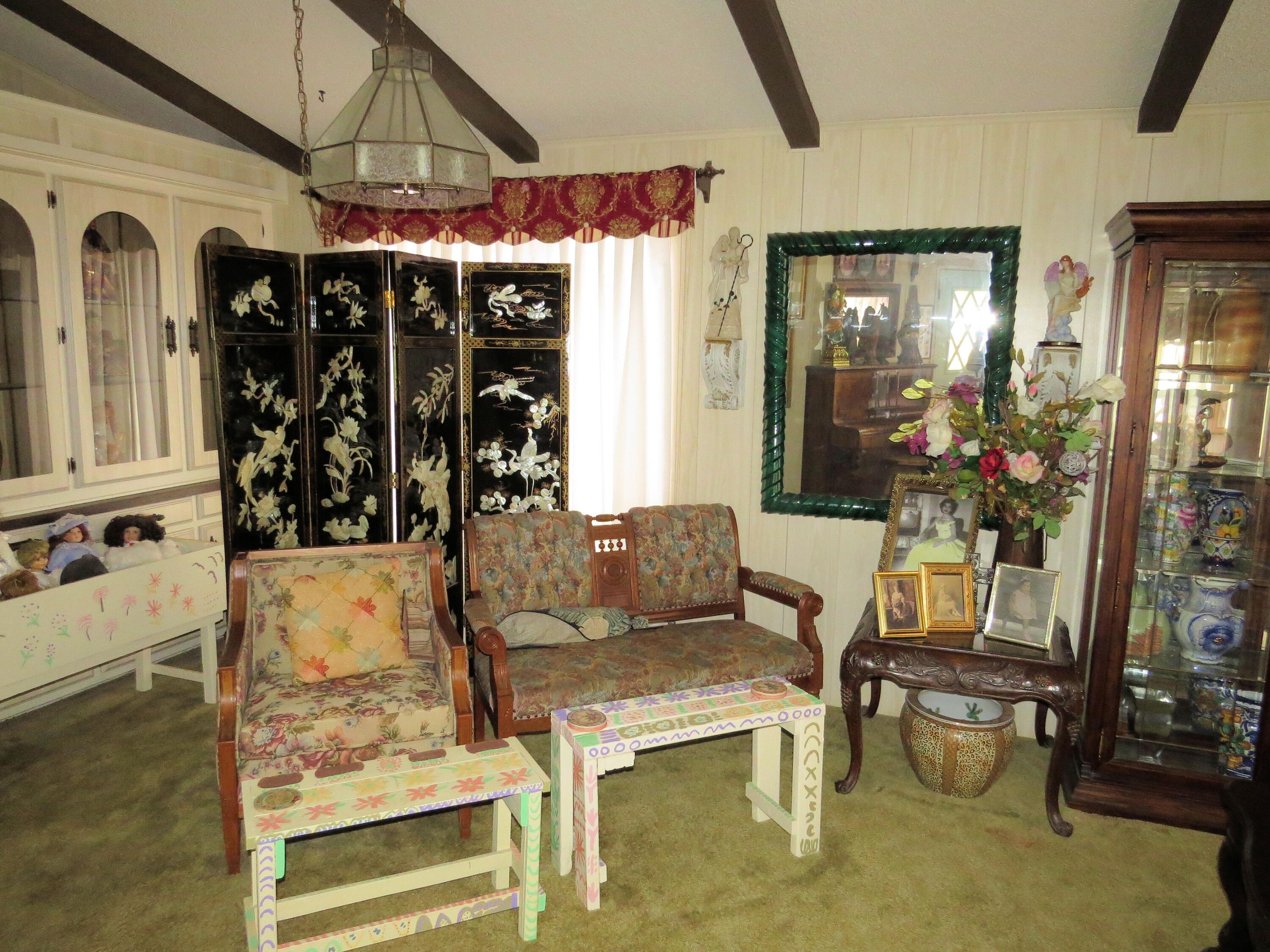 34980 Serenade Thousand Palms, CA 92276 - Photo 9 of 37 a living room filled with furniture