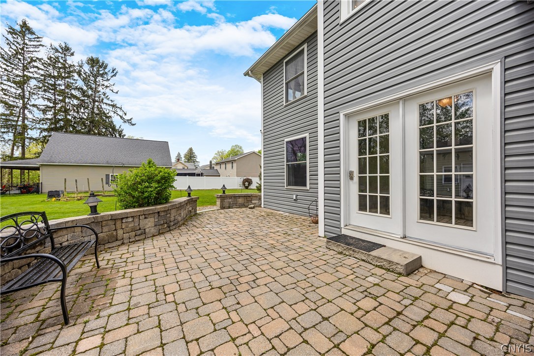 78 Seneca Avenue Vernon, NY 13421 - Photo 19 of 21 Rear entrance w/ paver patio
