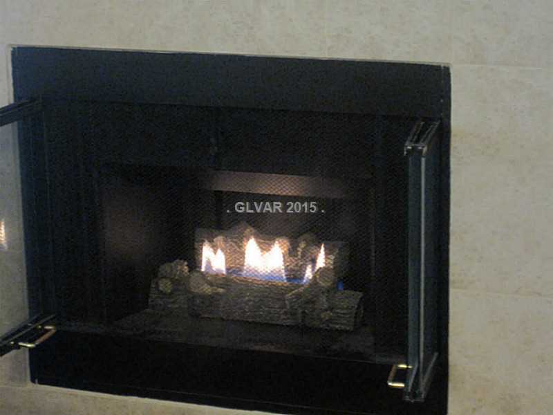 8971 Manhattan Road Henderson, NV 89074 - Photo 7 of 31 Family Room. Fireplace