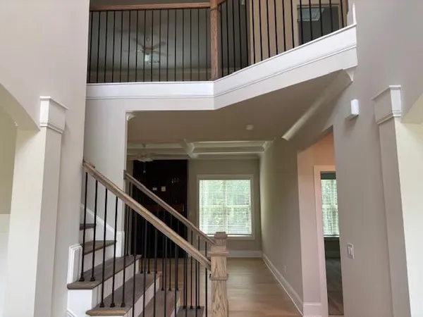 a stairs of a house with wooden floor