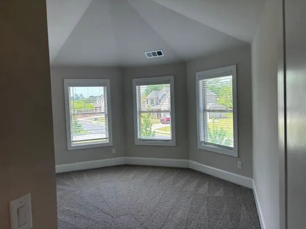 a bathroom with a sink a vanity and a mirror
