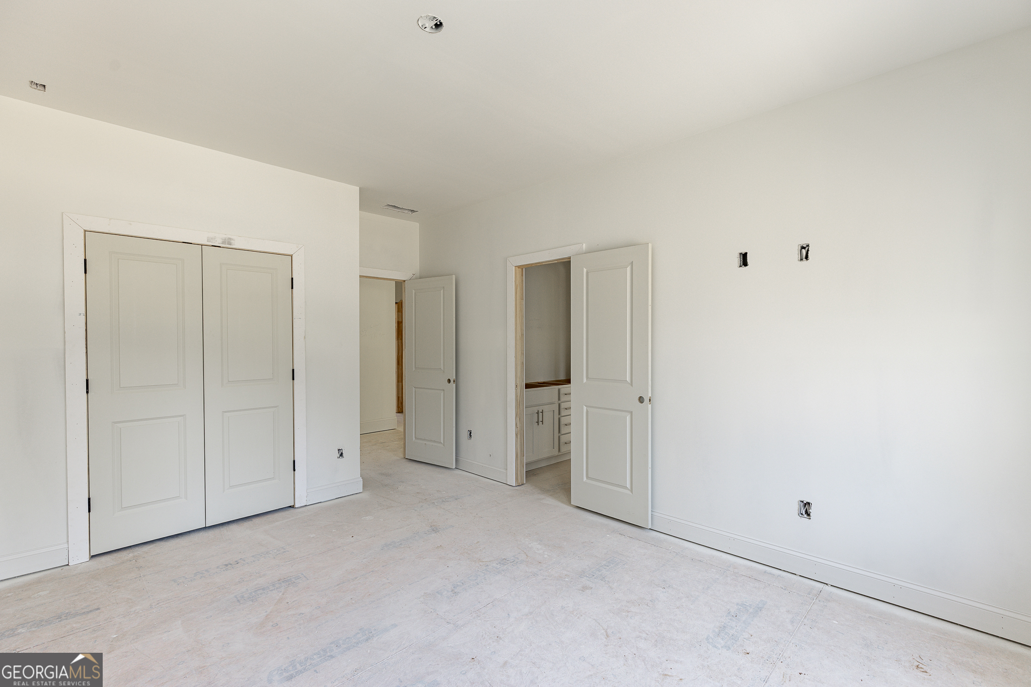 2969 North Bogan Road Northeast, Unit 1 Buford, GA 30519 - Photo 29 of 51 a view of an empty room
