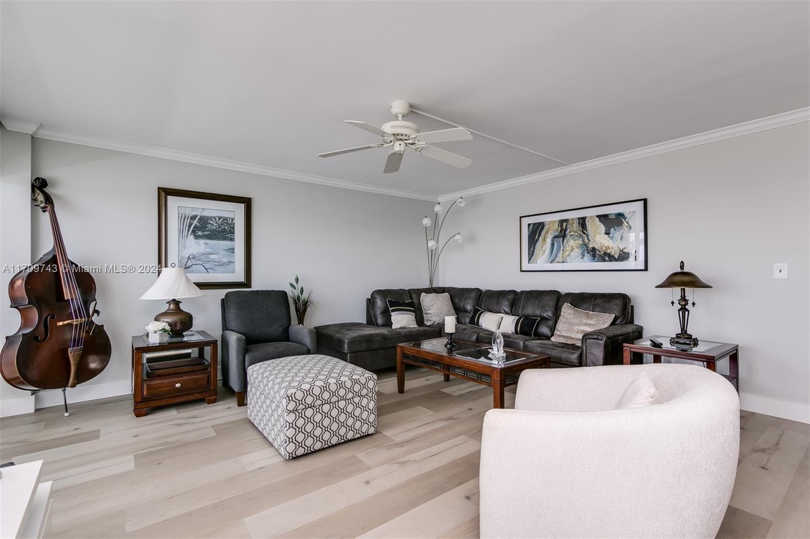 1200 South Ocean Boulevard, Unit PHF Boca Raton, FL 33432 - Photo 13 of 65 a living room with furniture and a window