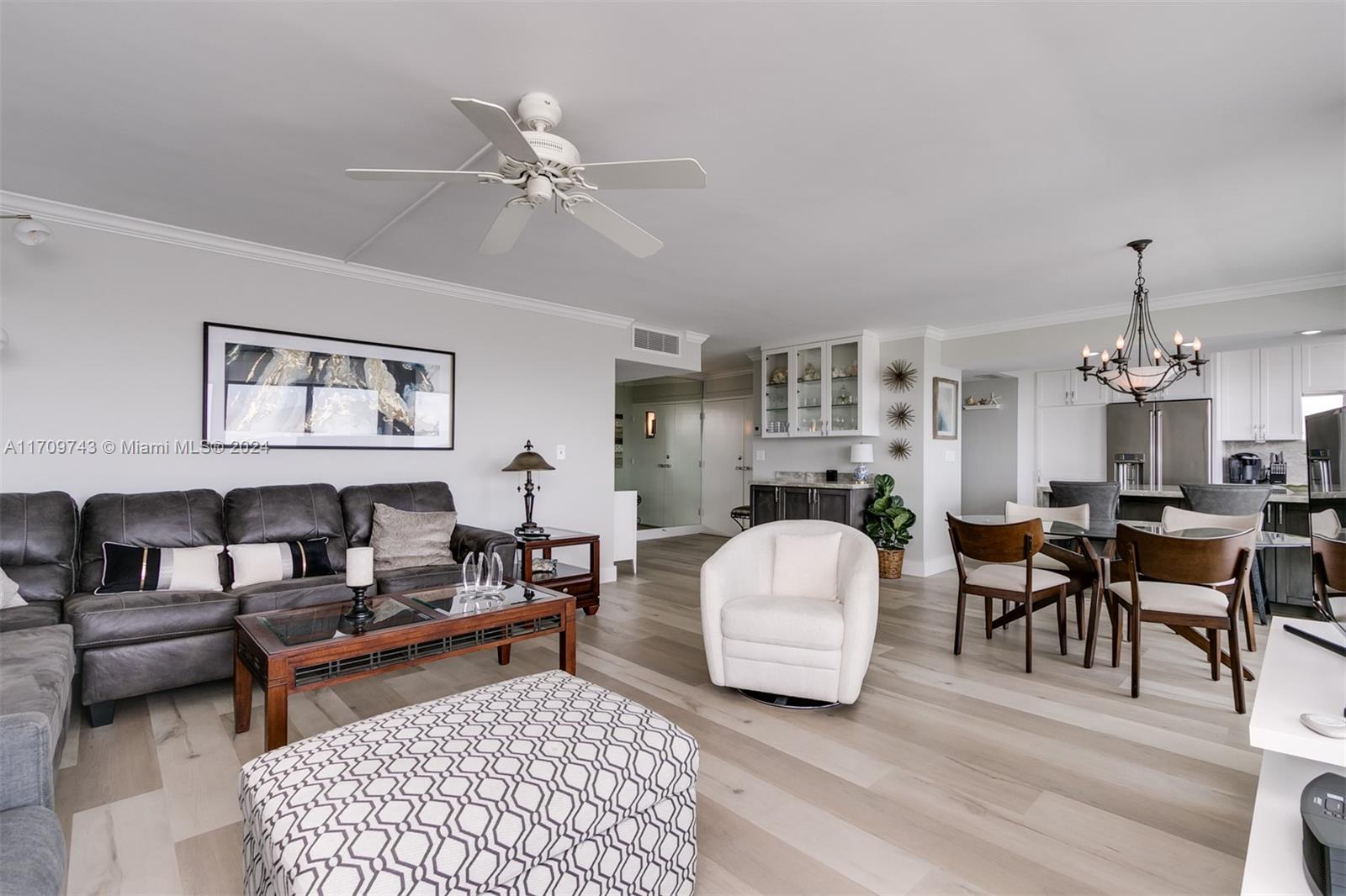 1200 South Ocean Boulevard, Unit PHF Boca Raton, FL 33432 - Photo 14 of 65 a living room with furniture and a table