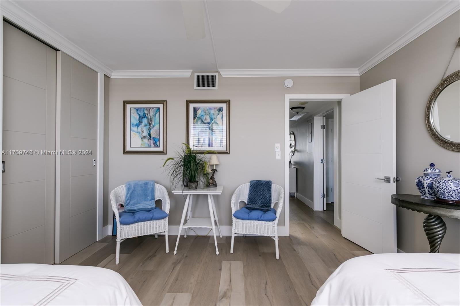 1200 South Ocean Boulevard, Unit PHF Boca Raton, FL 33432 - Photo 24 of 65 a living room with furniture and wooden floor