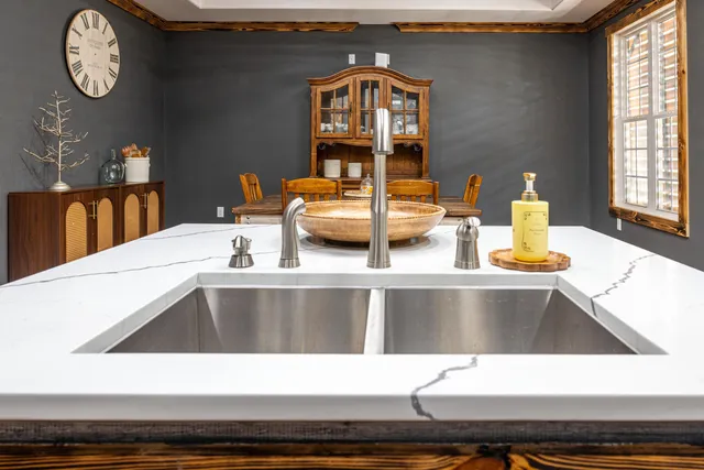 a bedroom with a bed and a shower