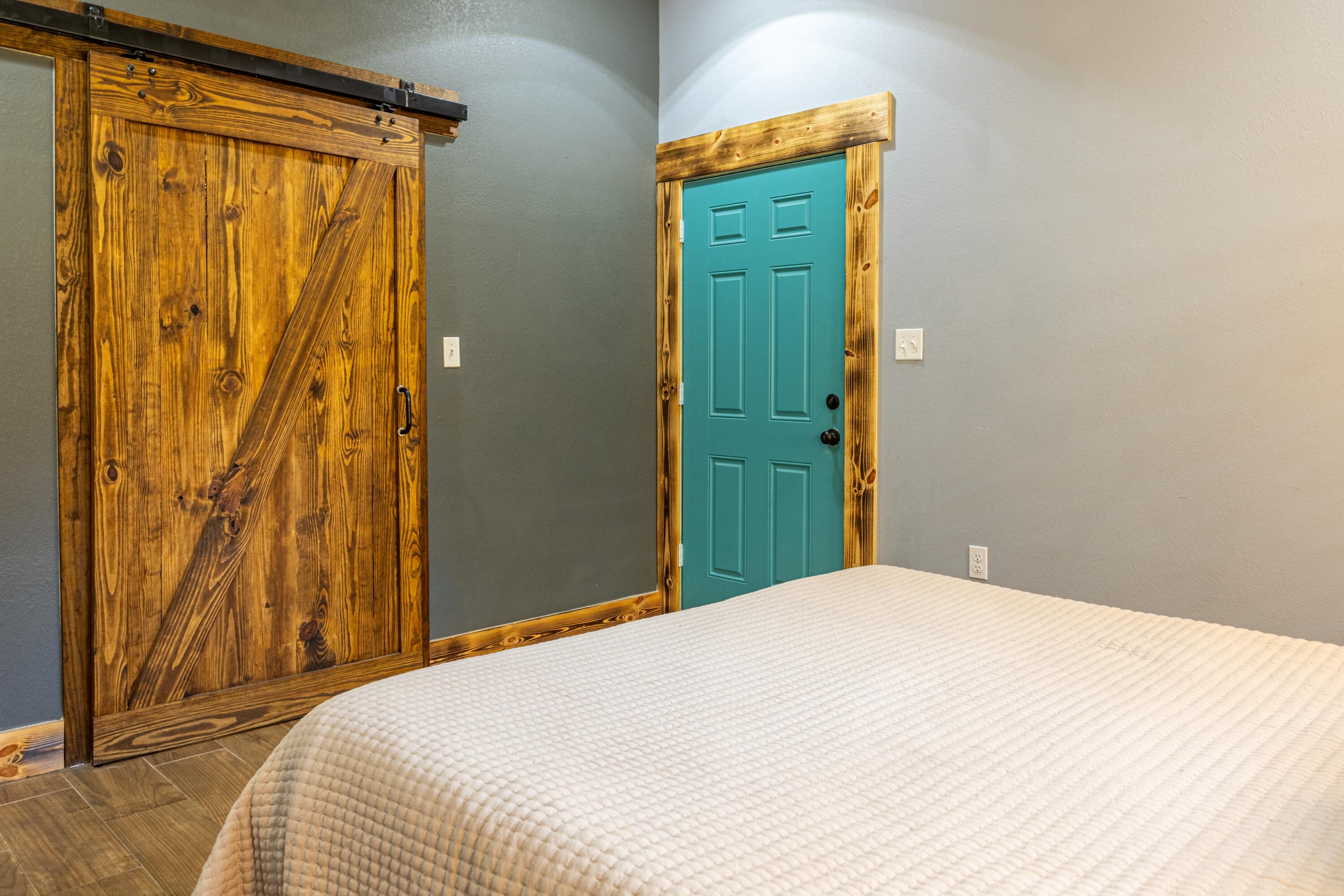 981 East Chestnut Avenue Crestview, FL 32539 - Photo 21 of 64 a bedroom with a bed and a shower