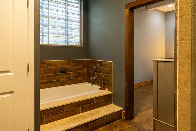 a view of a livingroom with furniture and a window