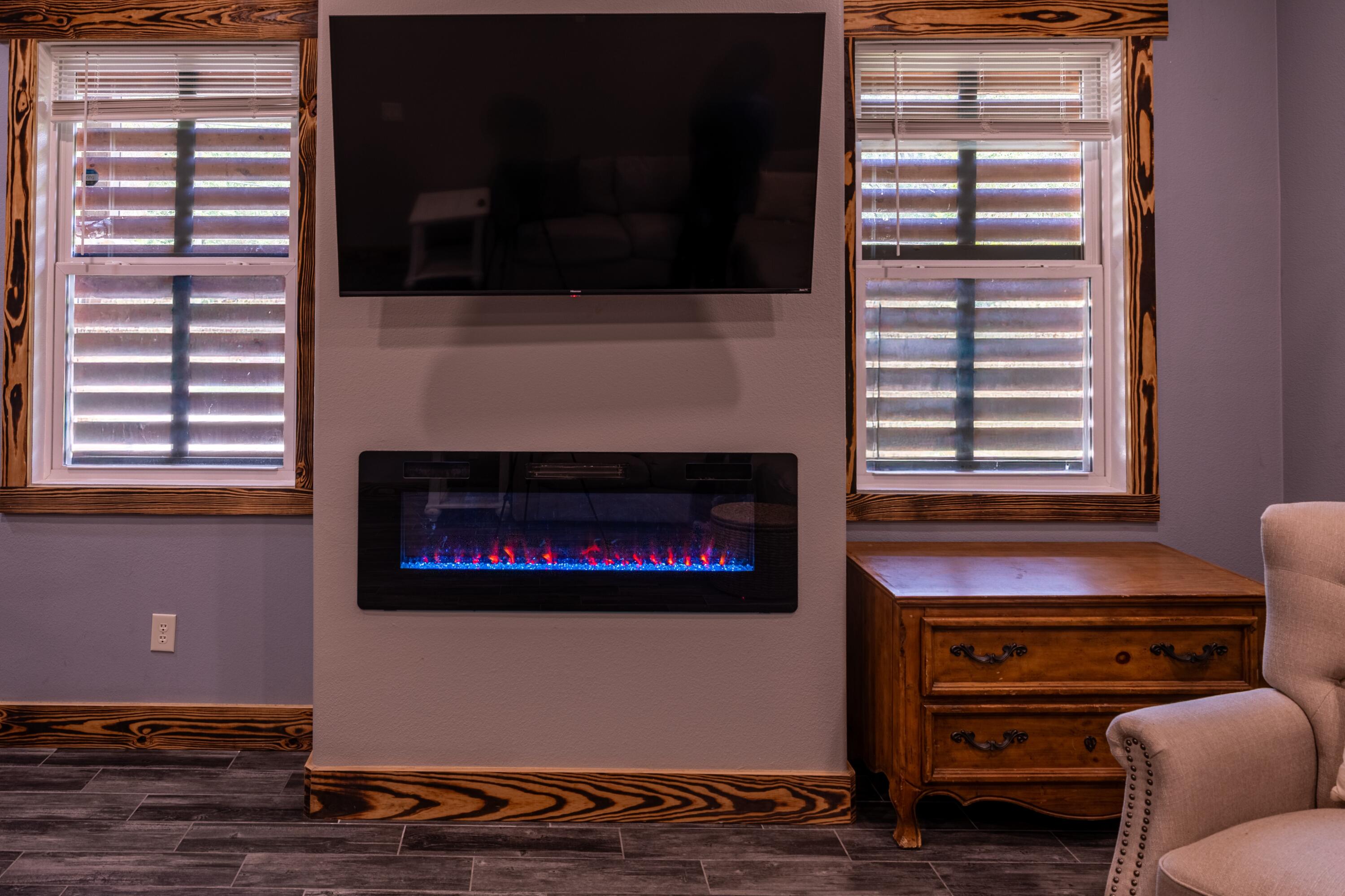 981 East Chestnut Avenue Crestview, FL 32539 - Photo 30 of 64 a living room with furniture and a fireplace