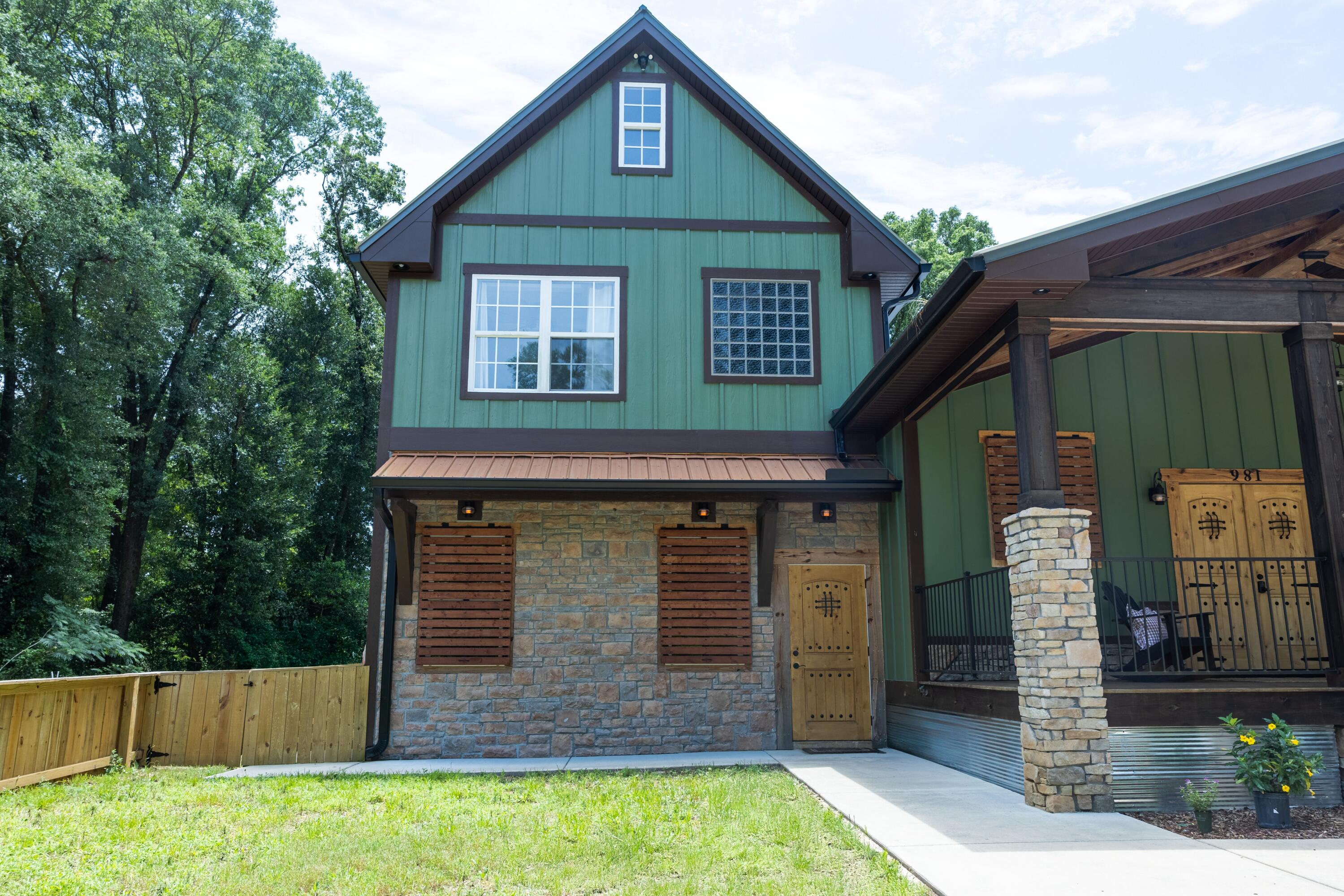981 East Chestnut Avenue Crestview, FL 32539 - Photo 3 of 64 a front view of a house with garden