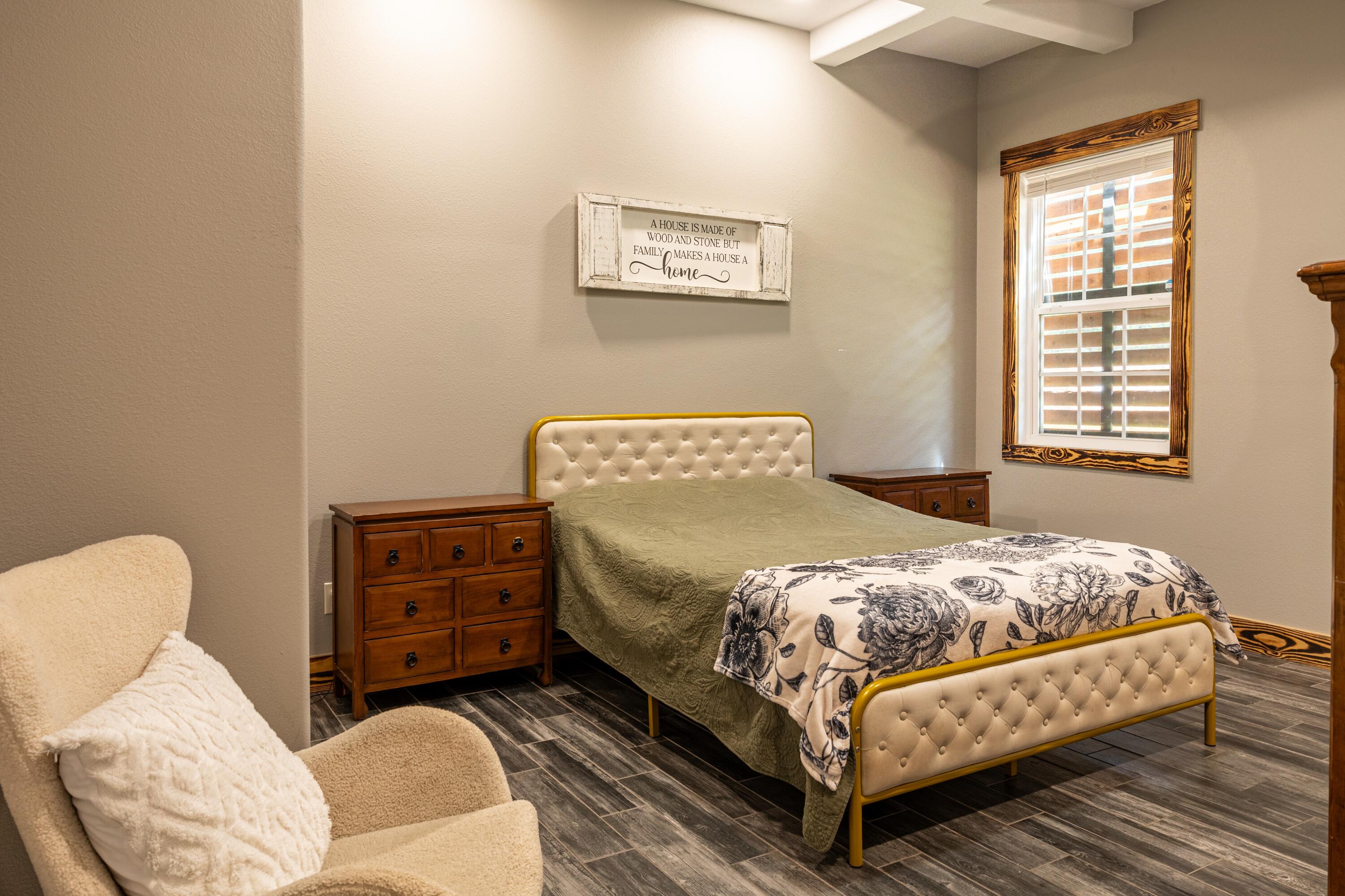 981 East Chestnut Avenue Crestview, FL 32539 - Photo 42 of 64 a bedroom with a bed and window