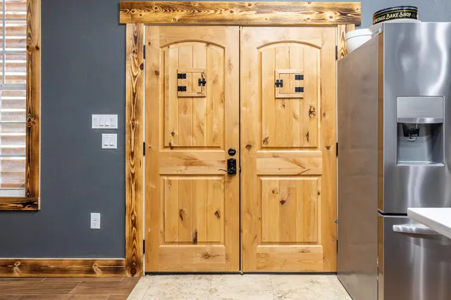 a view of a kitchen with furniture and a kitchen view