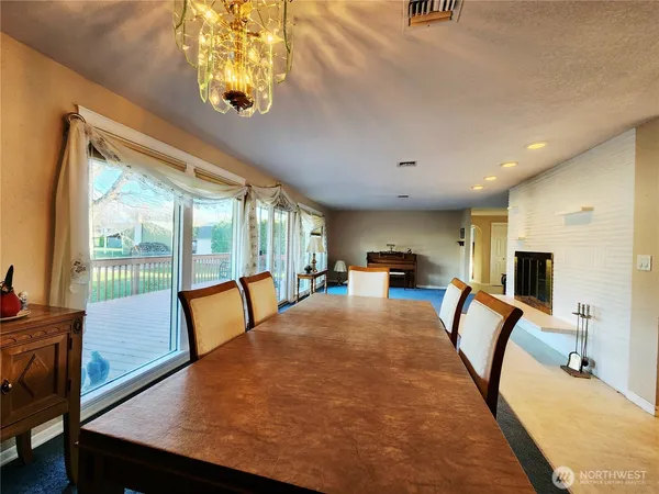 a view of balcony with wooden floor