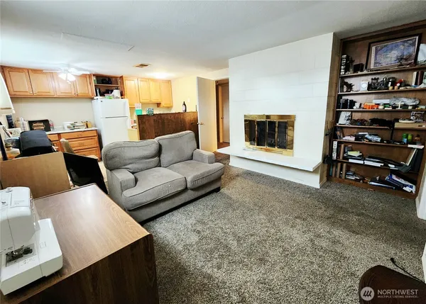 a bedroom with a bed and lamp