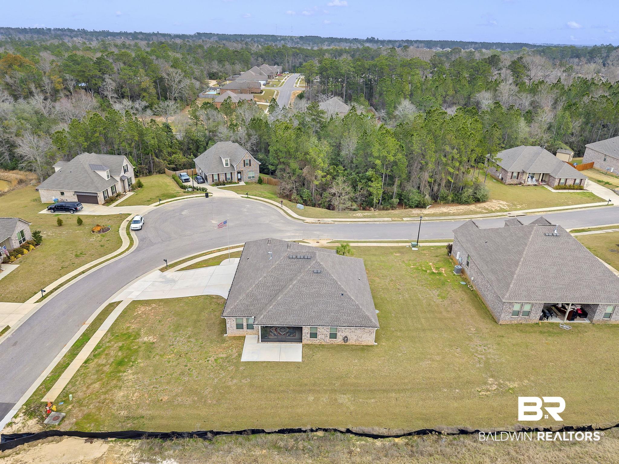 11247 Thistledown Loop Spanish Fort, AL 36527 - Photo 51 of 72 Bird's eye view with a wooded view and a residential view