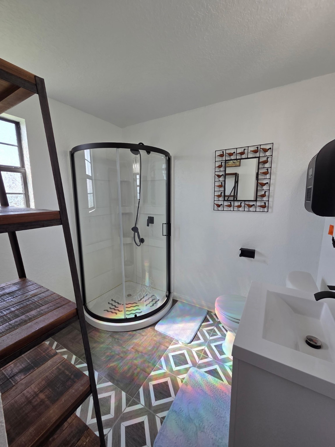 714 Caisson Street Surfside Beach, TX 77541 - Photo 11 of 12 a bathroom with a sink and a mirror