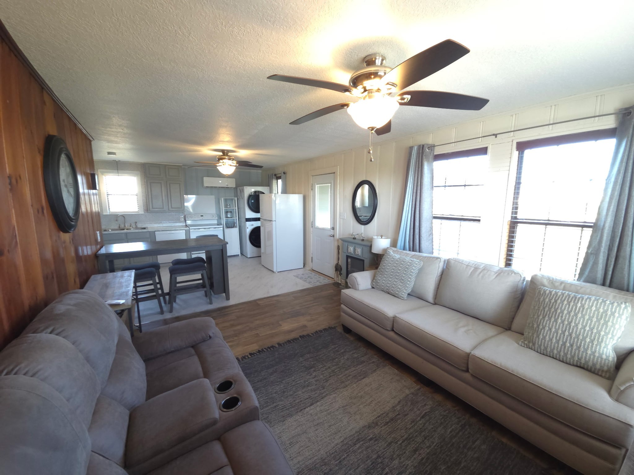 714 Caisson Street Surfside Beach, TX 77541 - Photo 3 of 12 a living room with furniture and wooden floor