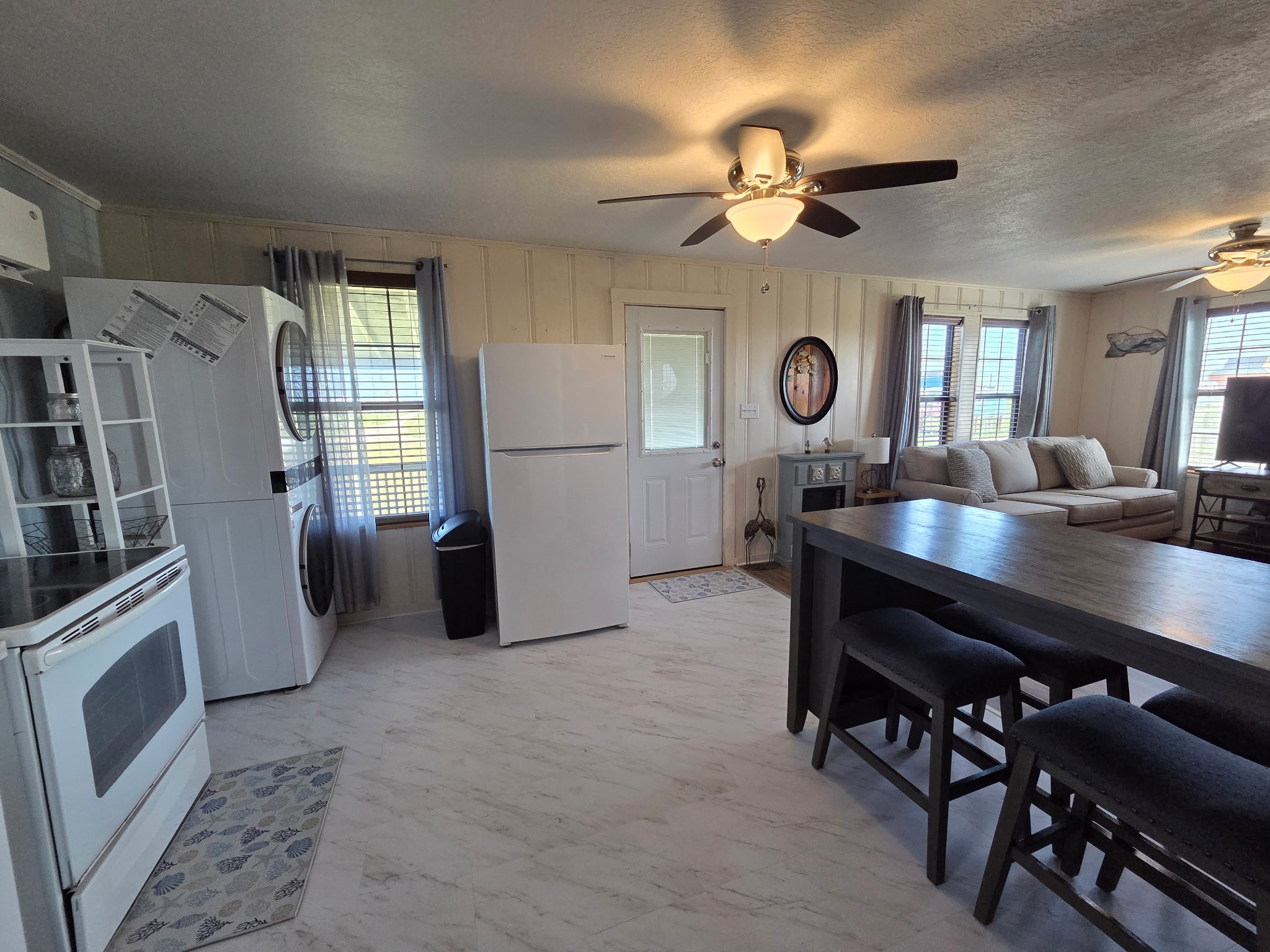 714 Caisson Street Surfside Beach, TX 77541 - Photo 6 of 12 a view of a livingroom with furniture window and wooden floor
