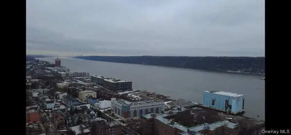a view of roof deck with furniture