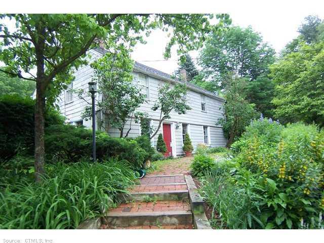 30 Prospect Mountain Road Salisbury, CT 06068 - Photo 1 of 1 a front view of a house with garden