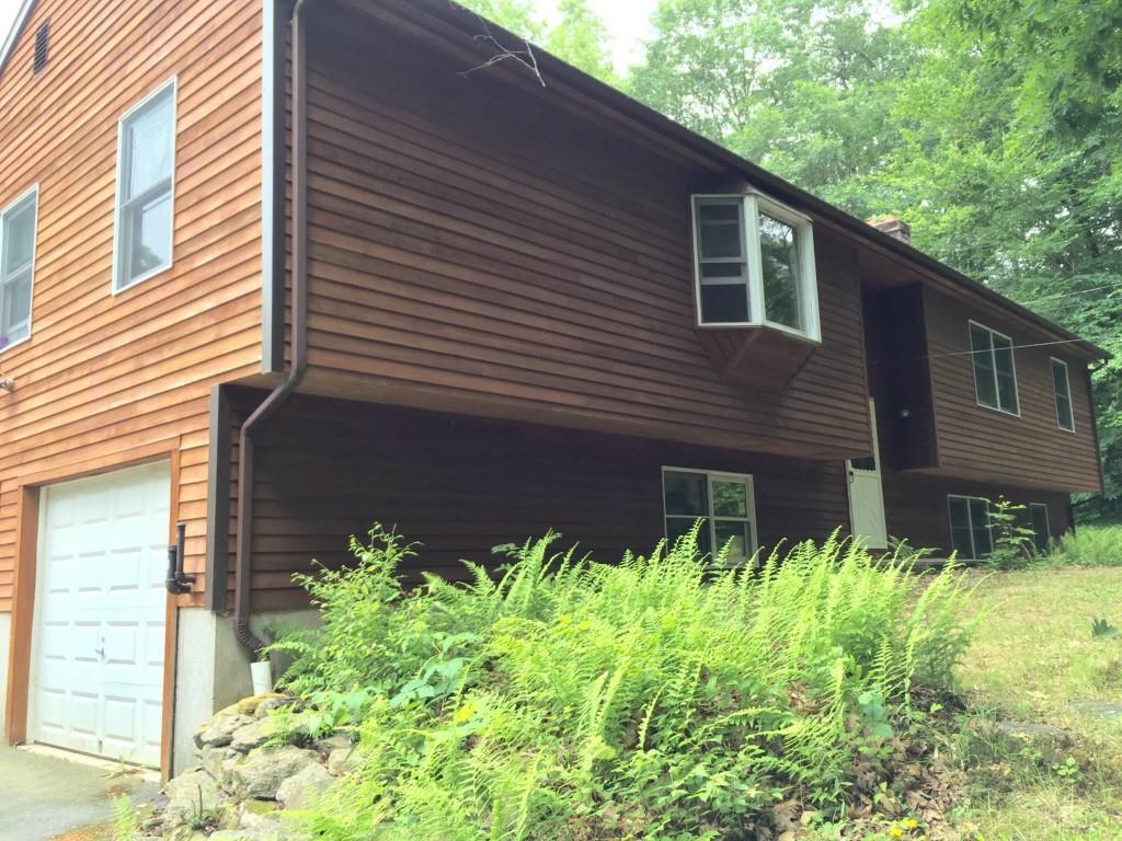 177 Bascom Road Lebanon, CT 06249 - Photo 1 of 1 a view of a backyard with plants