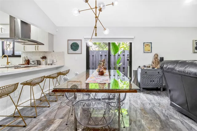 a view of a living room and dining room