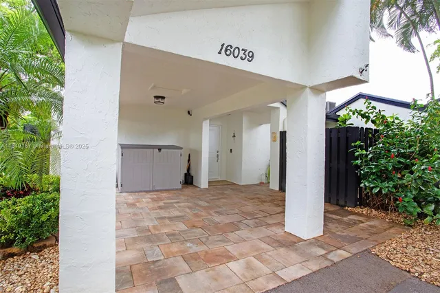 a view of a big room with potted plants