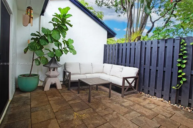 a outdoor dining space with furniture