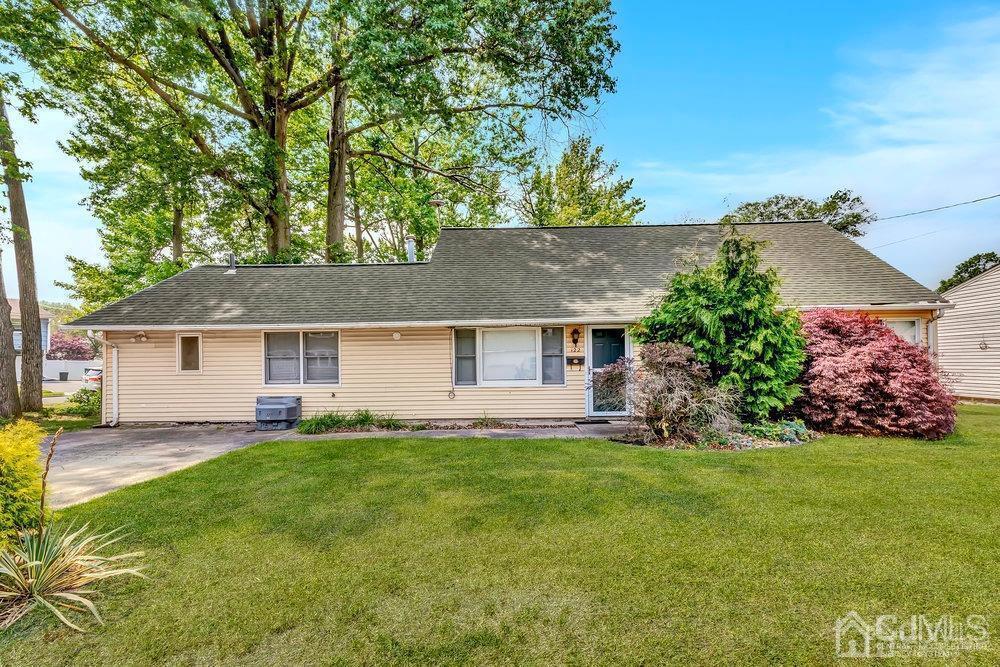 122 Vineyard Road Edison, NJ 08817 - Photo 2 of 24 front view of a house with a yard