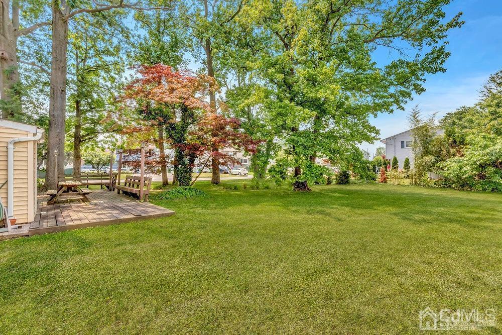122 Vineyard Road Edison, NJ 08817 - Photo 22 of 24 a view of yard with swimming pool