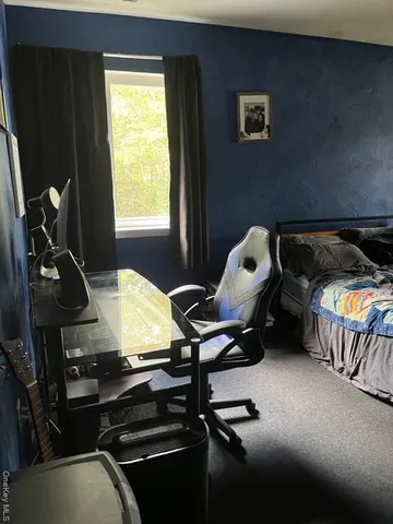 a room with furniture and window