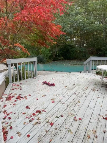 a view of a terrace with trees