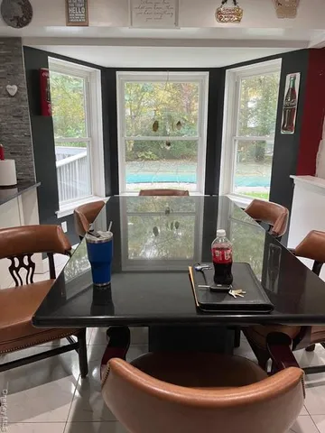 a room with furniture and window