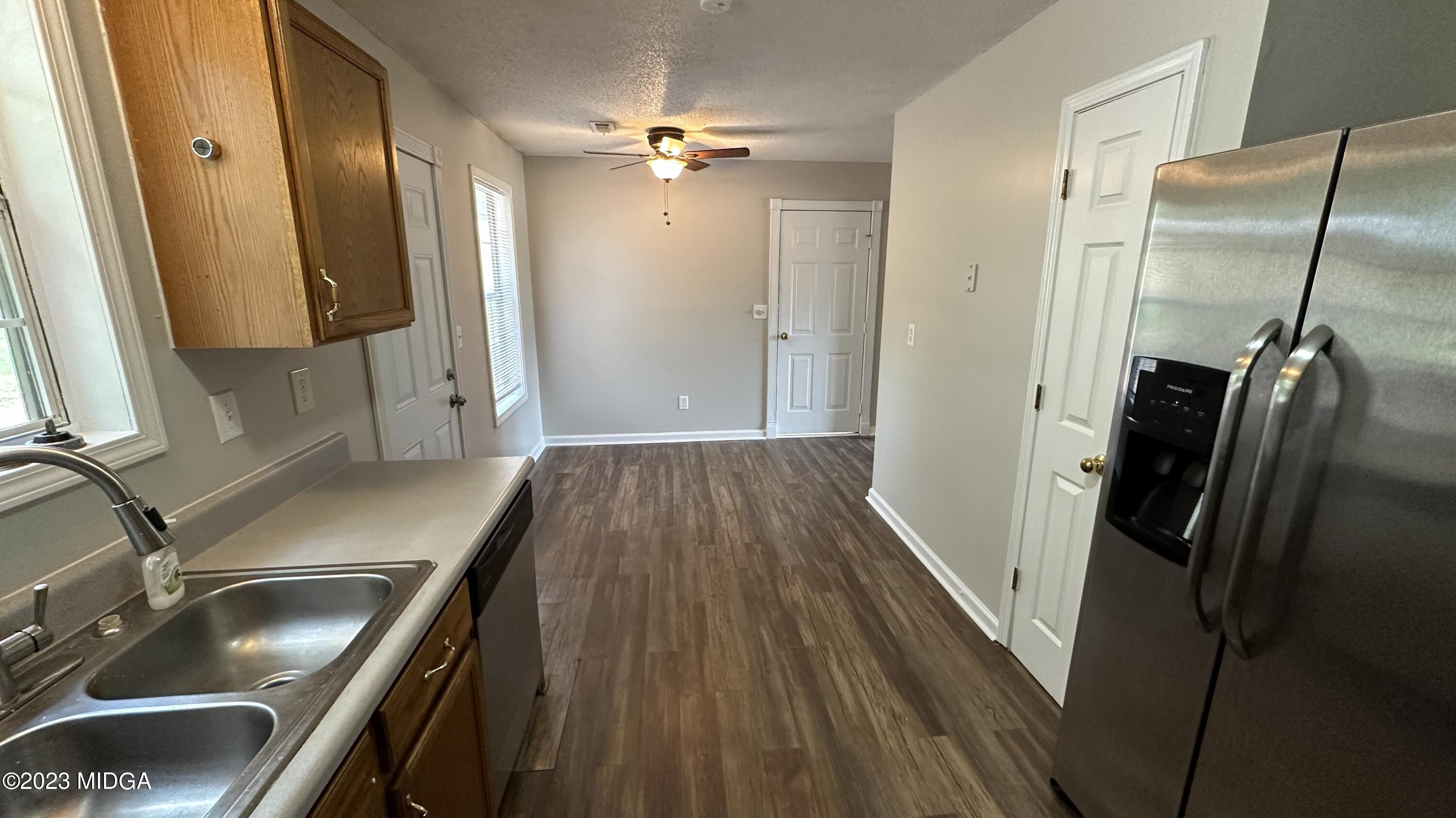 134 Haley Road Jackson, GA 30233 - Photo 4 of 11 a view of a kitchen from a living room