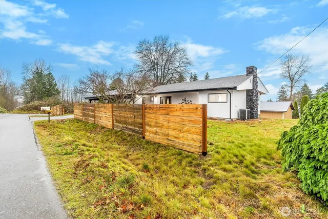 a view of a swimming pool with an outdoor space