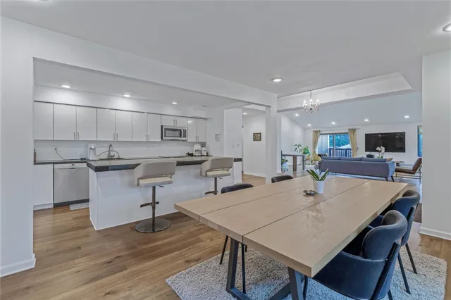 a large kitchen with stainless steel appliances