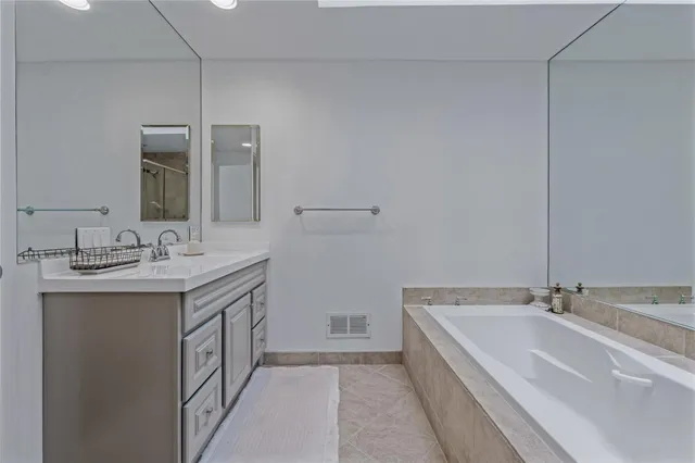 a bedroom with a bed and furniture