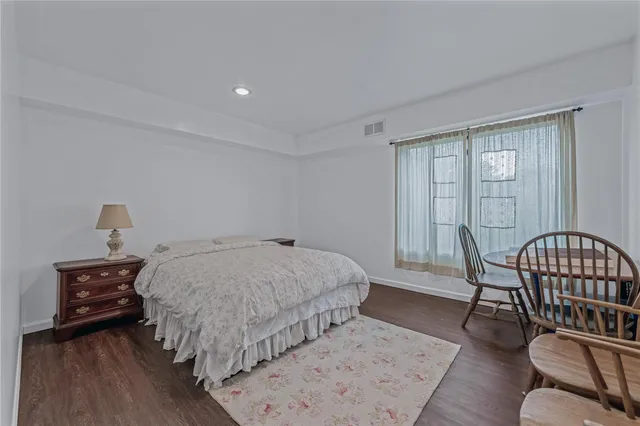 a backyard of a house with outdoor seating