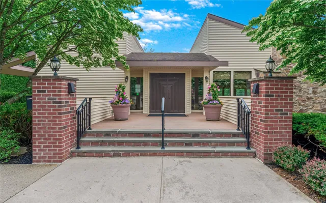 a kitchen with stainless steel appliances granite countertop a stove a sink dishwasher a refrigerator and a oven