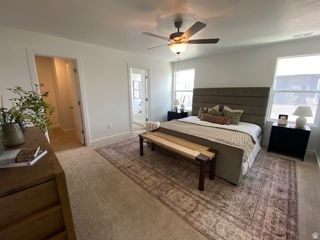 341 Quartz Road, Unit 8037 Tooele, UT 84074 - Photo 5 of 10 Spacious room featuring carpet flooring, a ceiling fan with integrated lighting, and two windows