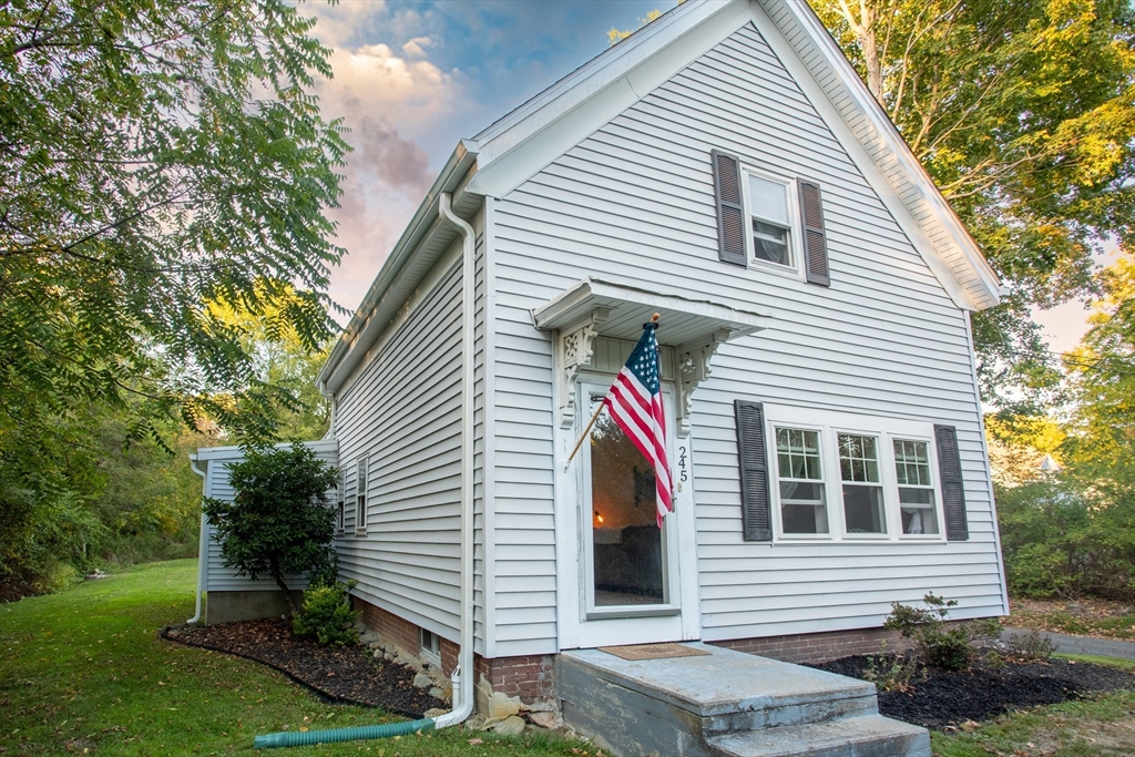 245 R Laurel Street East Bridgewater, MA 02333 - Photo 2 of 37 a view of house with a yard and potted plants