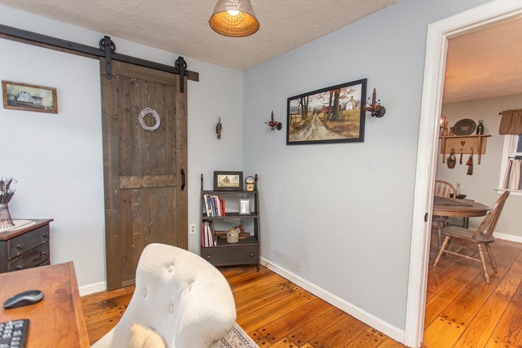245 R Laurel Street East Bridgewater, MA 02333 - Photo 22 of 37 a view of a bedroom with furniture and front door