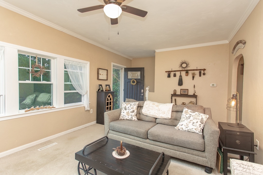 245 R Laurel Street East Bridgewater, MA 02333 - Photo 23 of 37 a living room with furniture and a large window