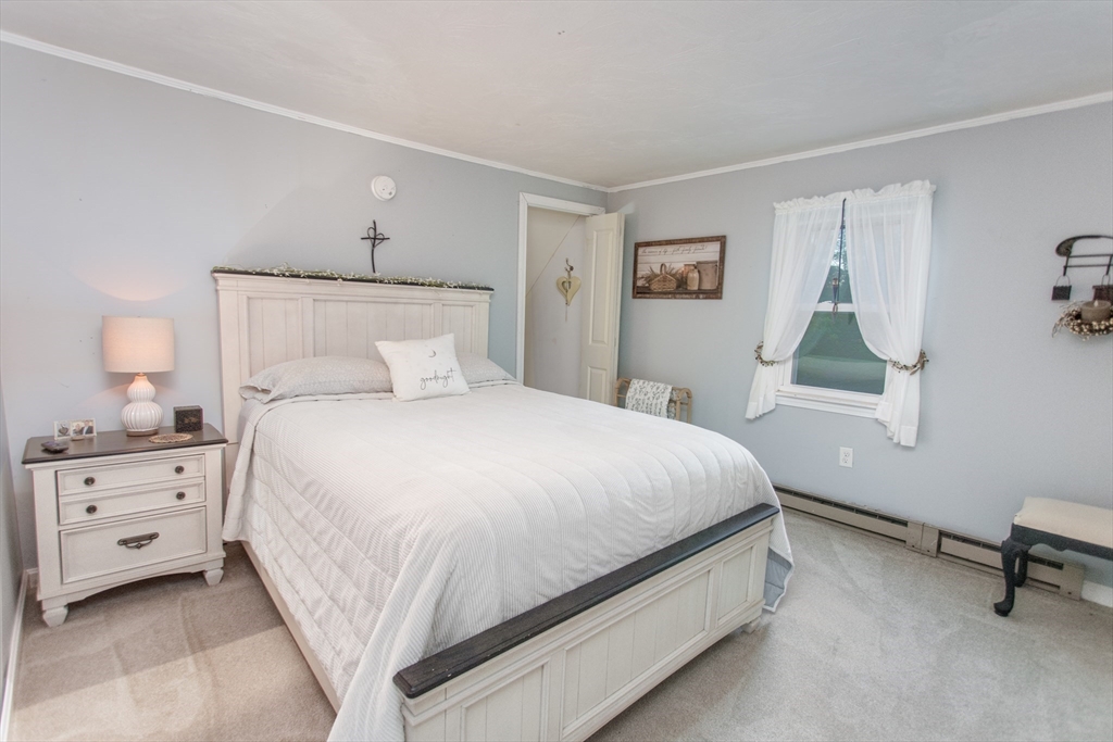 245 R Laurel Street East Bridgewater, MA 02333 - Photo 26 of 37 a bedroom with a bed and a window