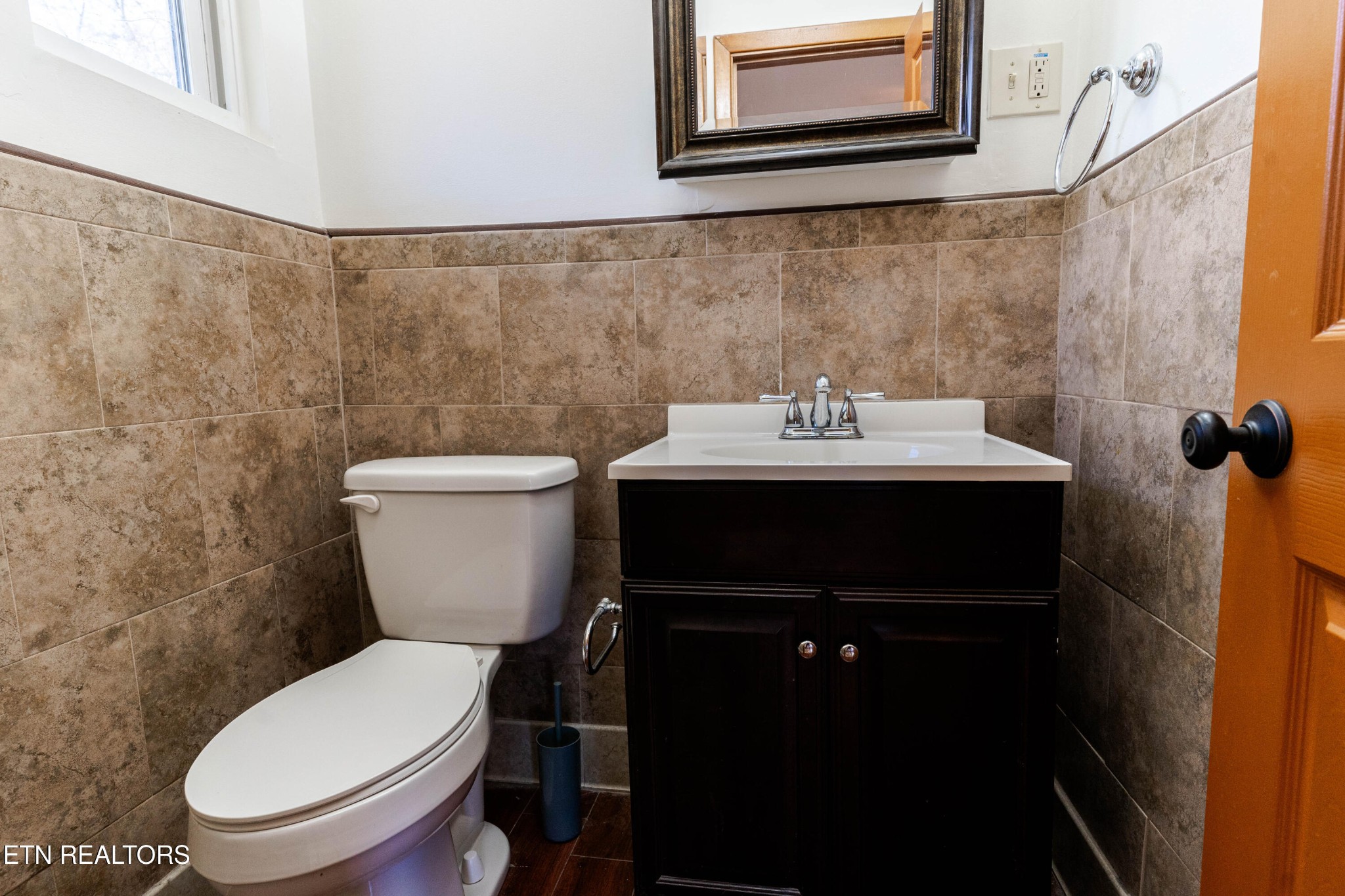 3424 Whittle Springs Road Knoxville, TN 37917 - Photo 17 of 29 a bathroom with a sink and a toilet