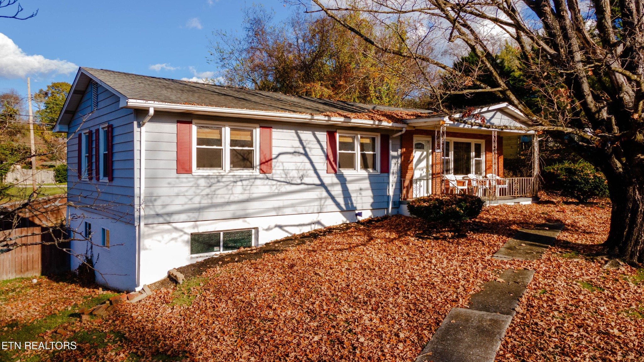3424 Whittle Springs Road Knoxville, TN 37917 - Photo 19 of 29 a view of a house with a snow on the wall