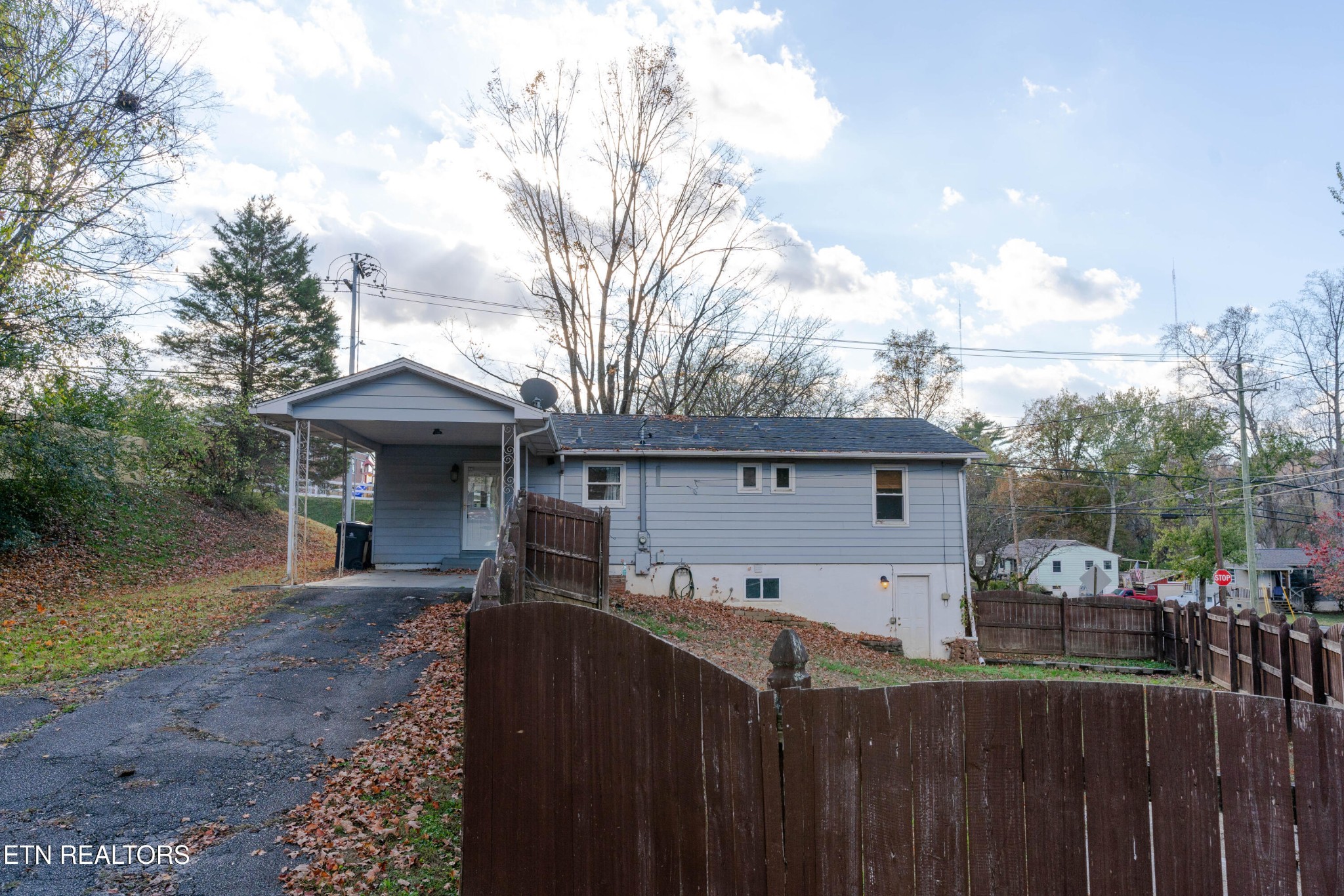 3424 Whittle Springs Road Knoxville, TN 37917 - Photo 27 of 29 a front view of house with yard and trees