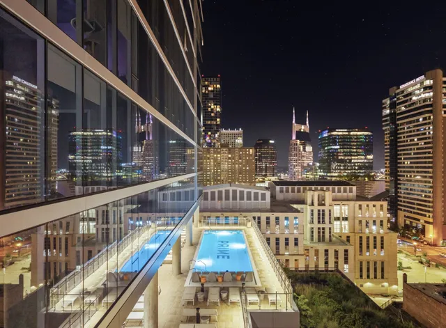 a view of a balcony with a potted plant