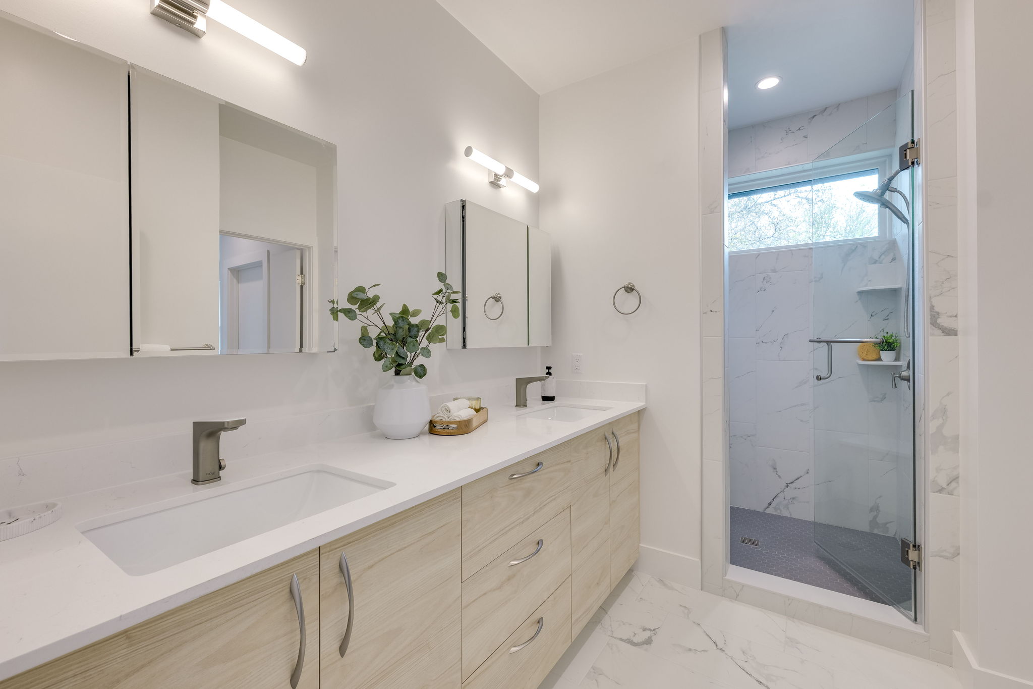 3014 Brass Buttons Trail Austin, TX 78734 - Photo 21 of 35 Great storage in the primary bath with large walk-in shower & dual vanities.
